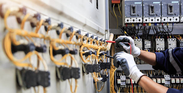Professional Electrician technician working in Manorhaven, NY